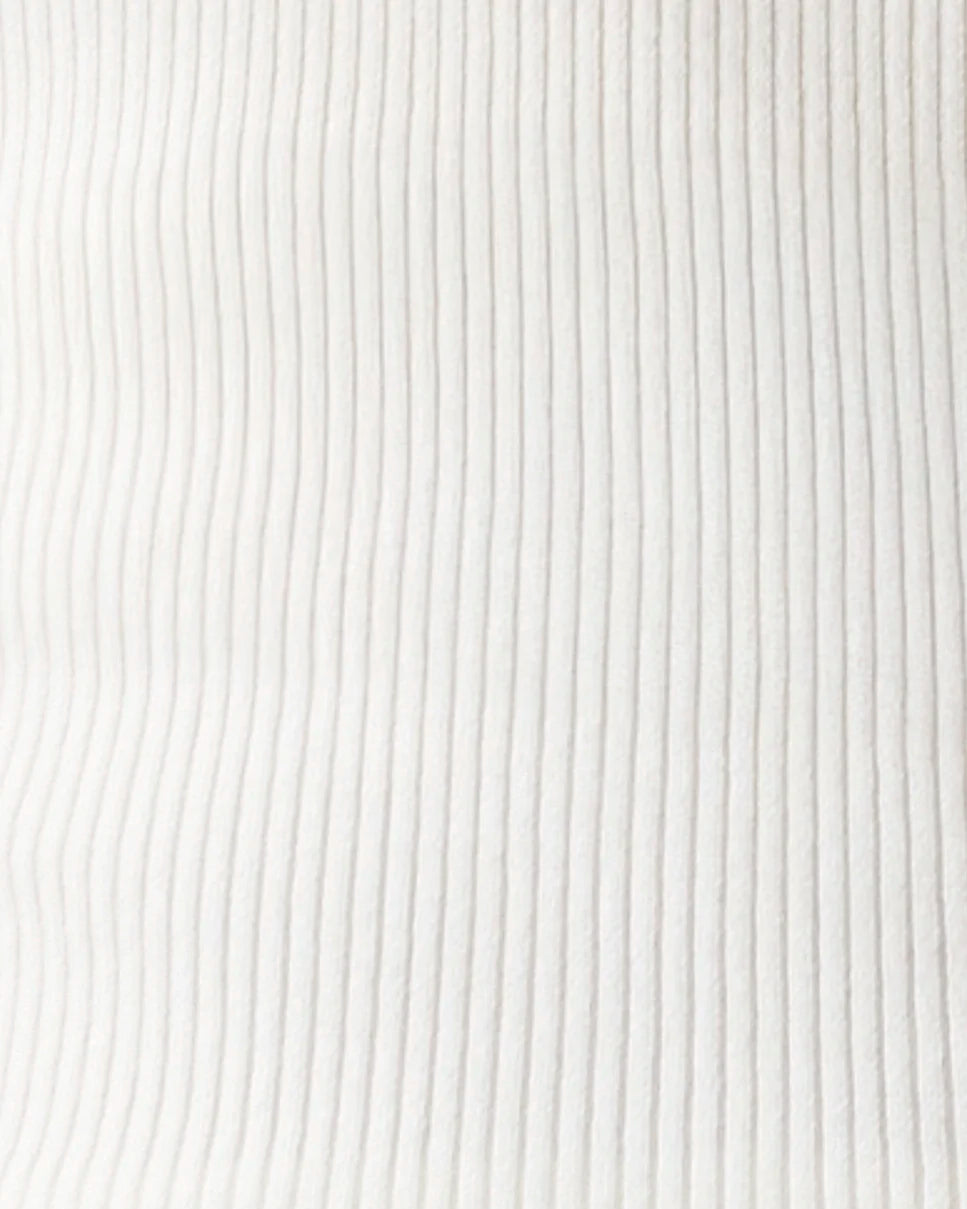Close-up of a white ribbed knit fabric texture with vertical corduroy-like ridges.