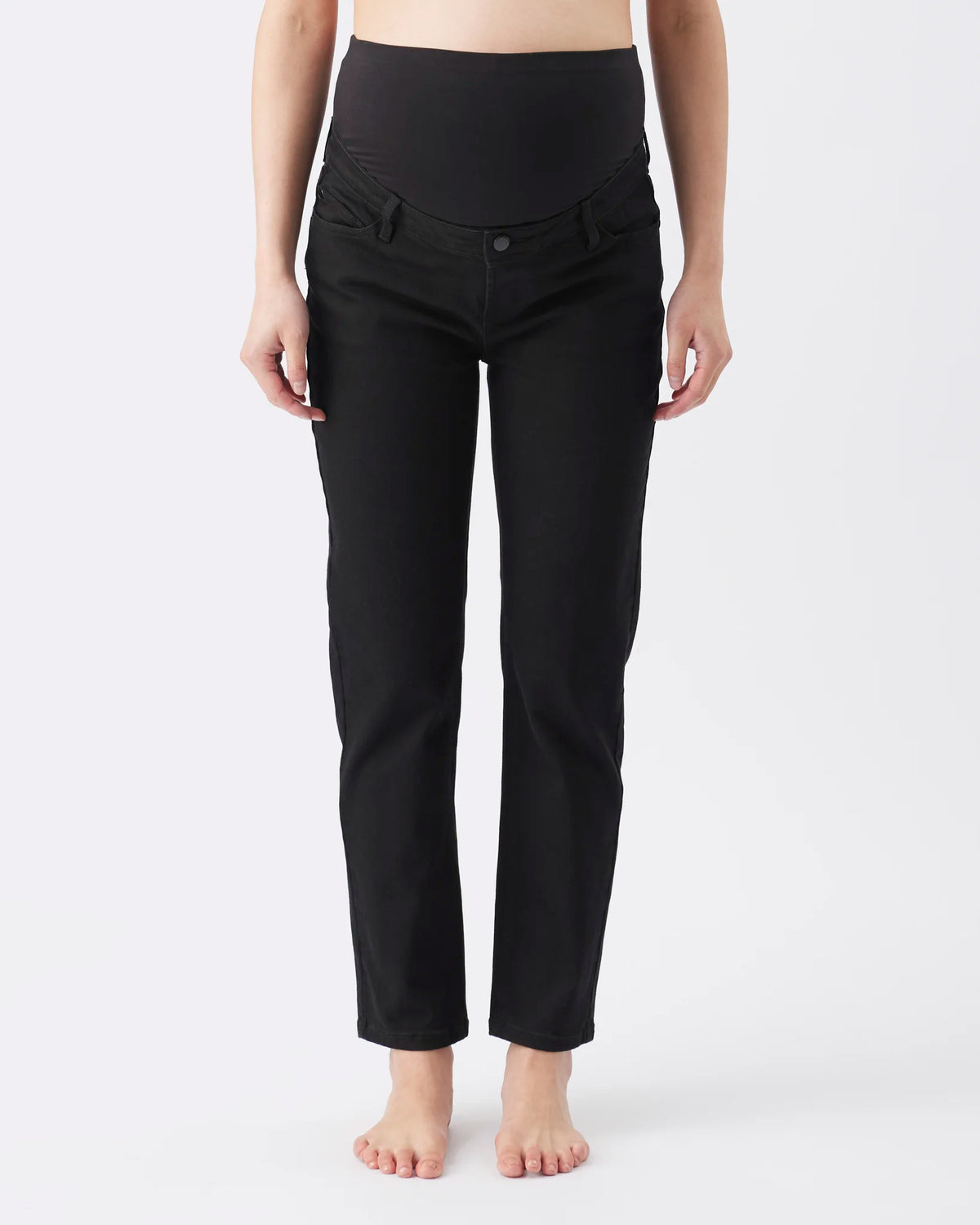 Black maternity pants with a wide, comfortable waistband, shown on a model from the waist down against a plain white background.