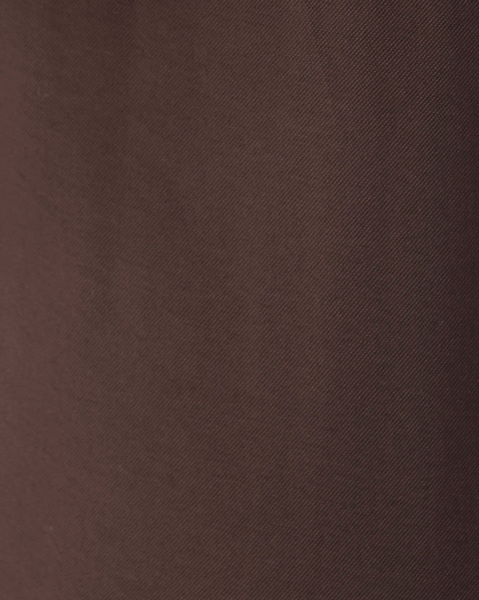 A close-up of dark brown fabric texture with a fine diagonal twill weave.
