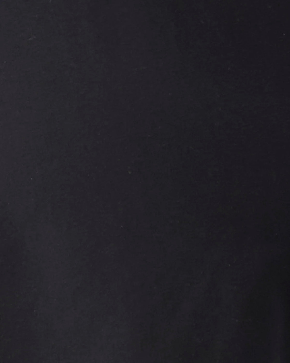 A close-up of a solid black fabric texture.
