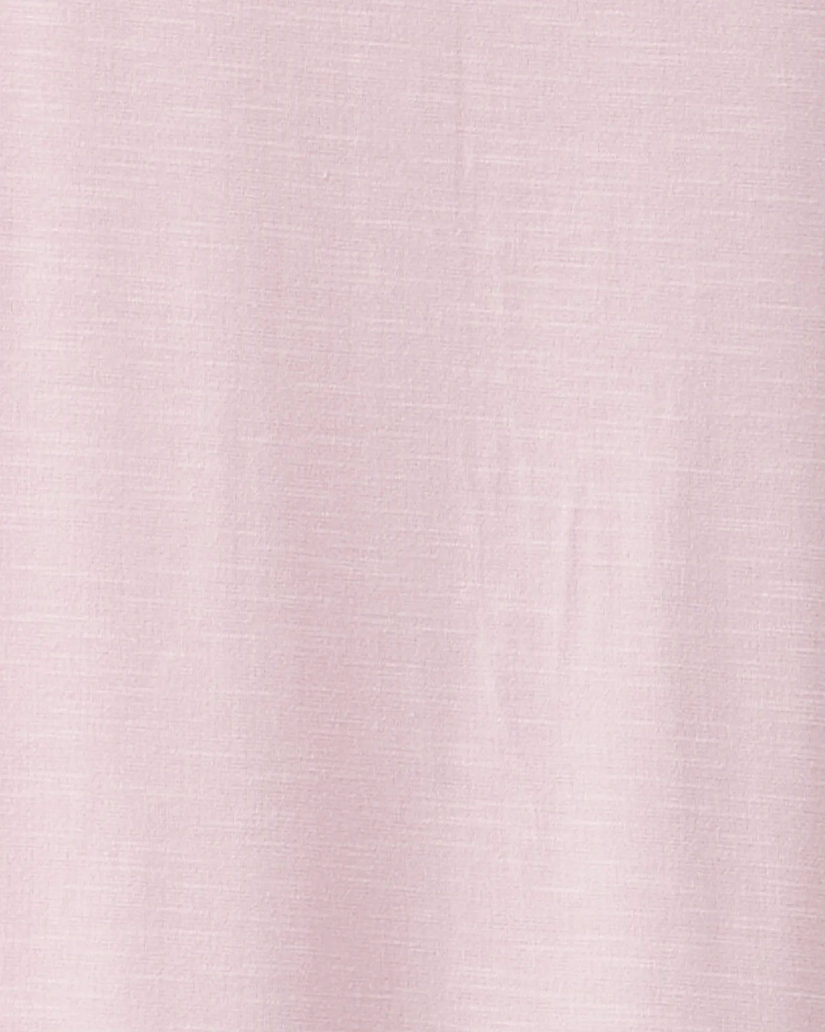 A close-up of a light pink textured fabric with a subtle linen-like weave.
