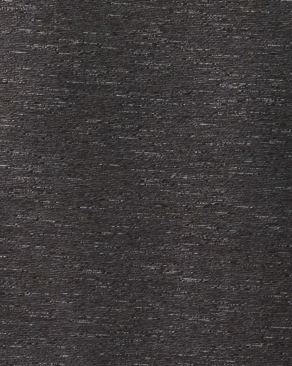 A close-up of a dark charcoal gray textured fabric with a fine heathered weave.