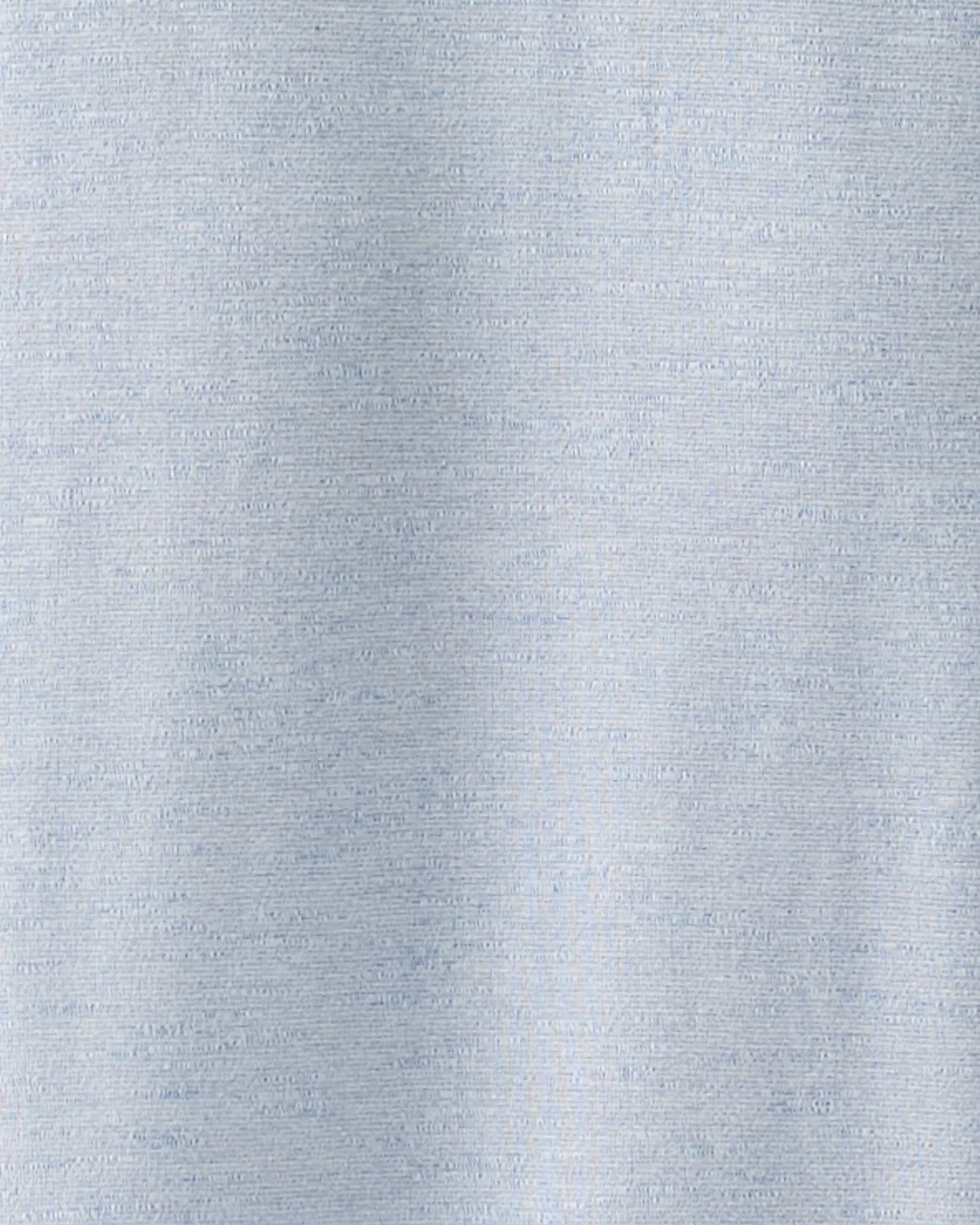 A close-up of a light gray heathered fabric texture, likely a cotton or cotton-blend garment material.