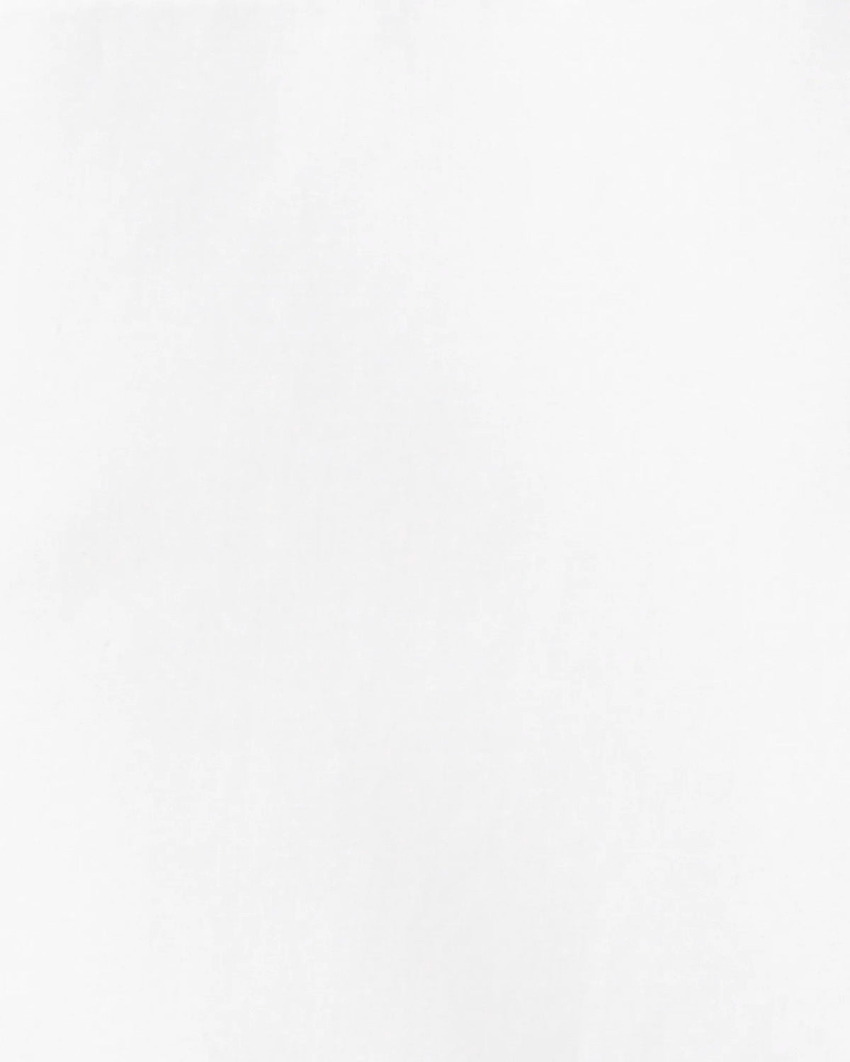 A solid white color swatch tile.