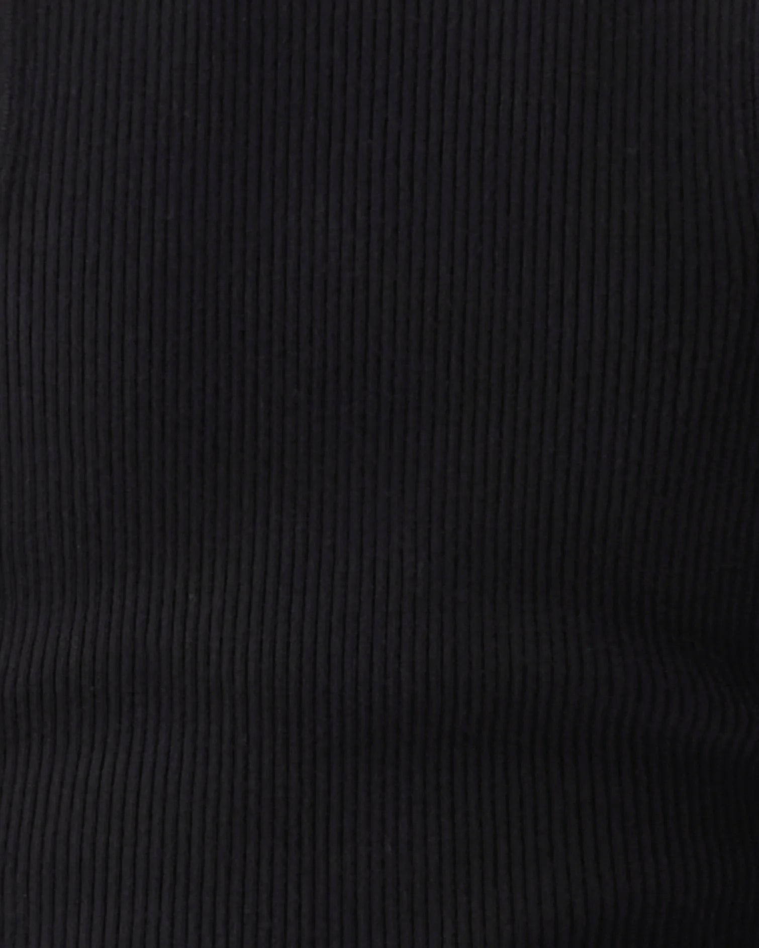 Close-up of a black ribbed fabric texture showing vertical corduroy-like ridges.