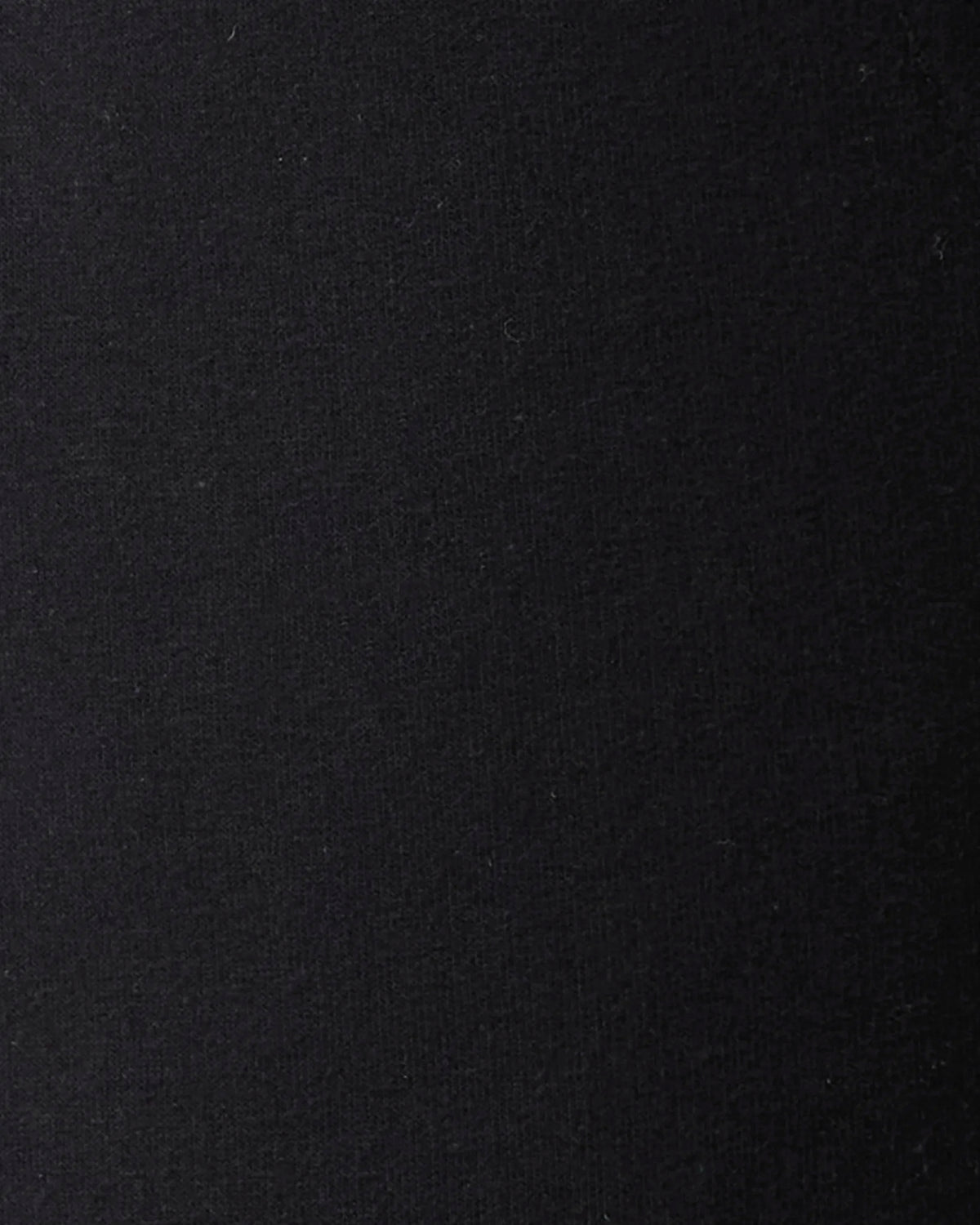 A close-up texture shot of a solid black fabric, showing a fine knit or woven grain.