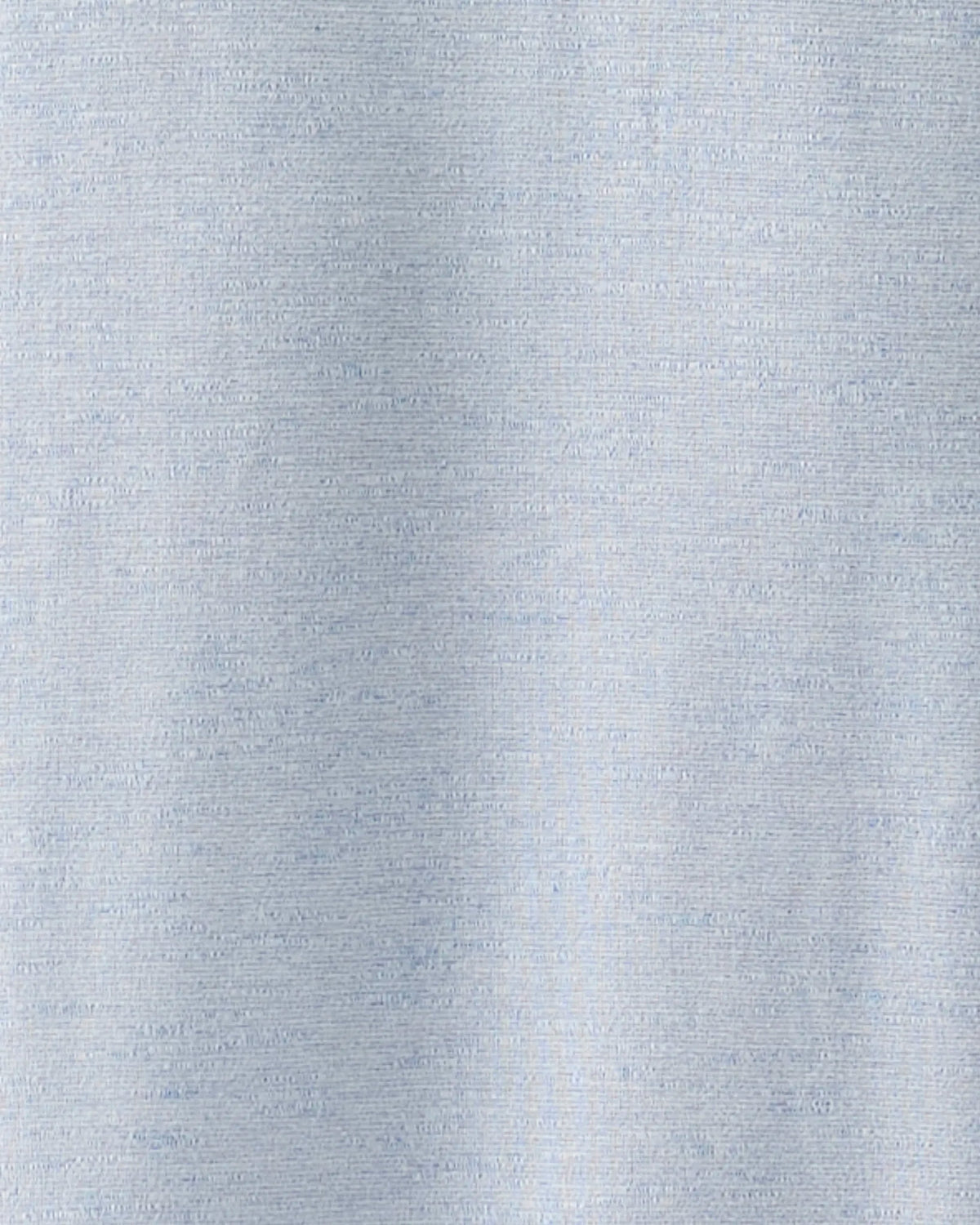 A close-up of a light gray heathered fabric texture, likely a cotton or cotton-blend garment material.