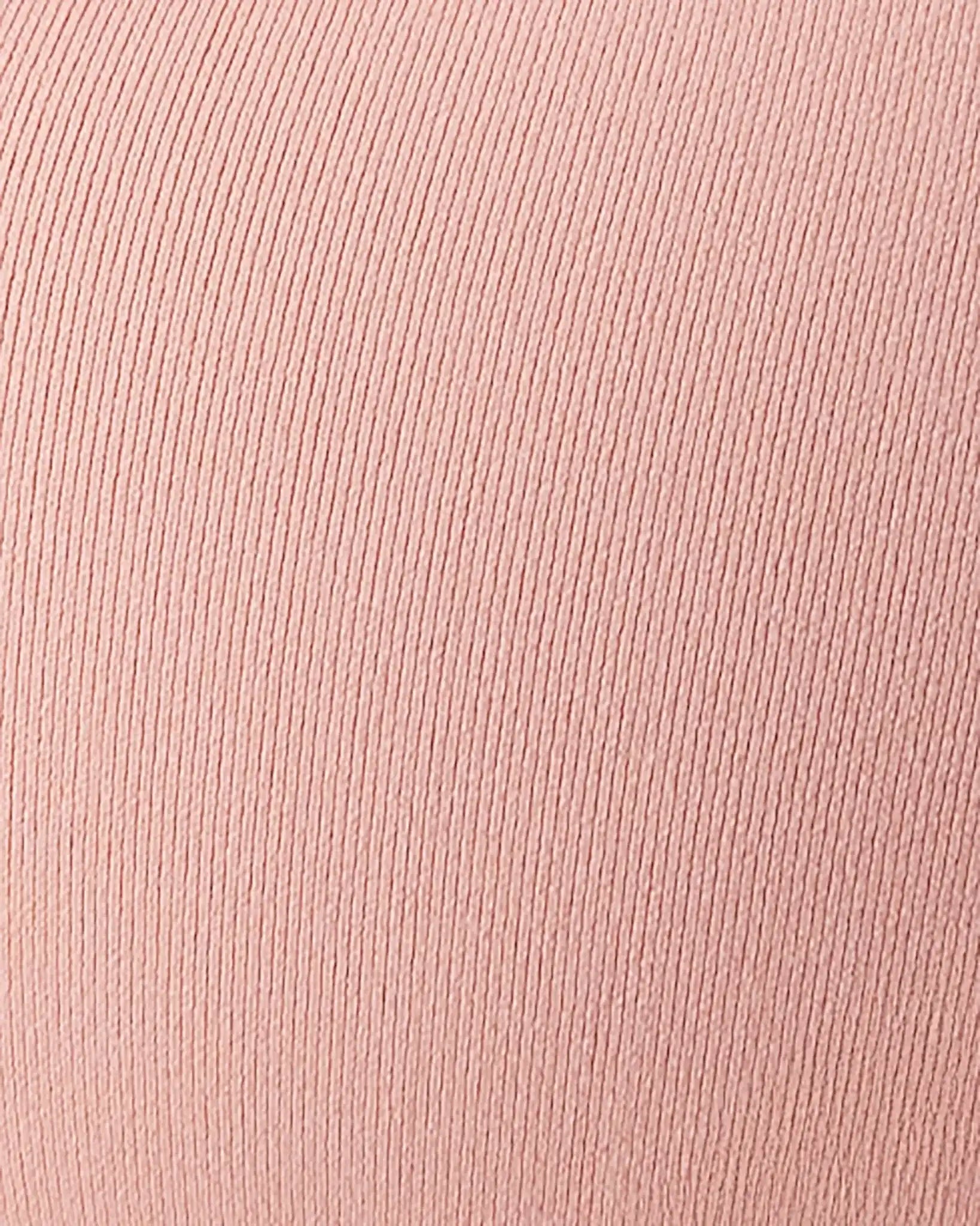 A close-up of a dusty pink ribbed knit fabric texture.