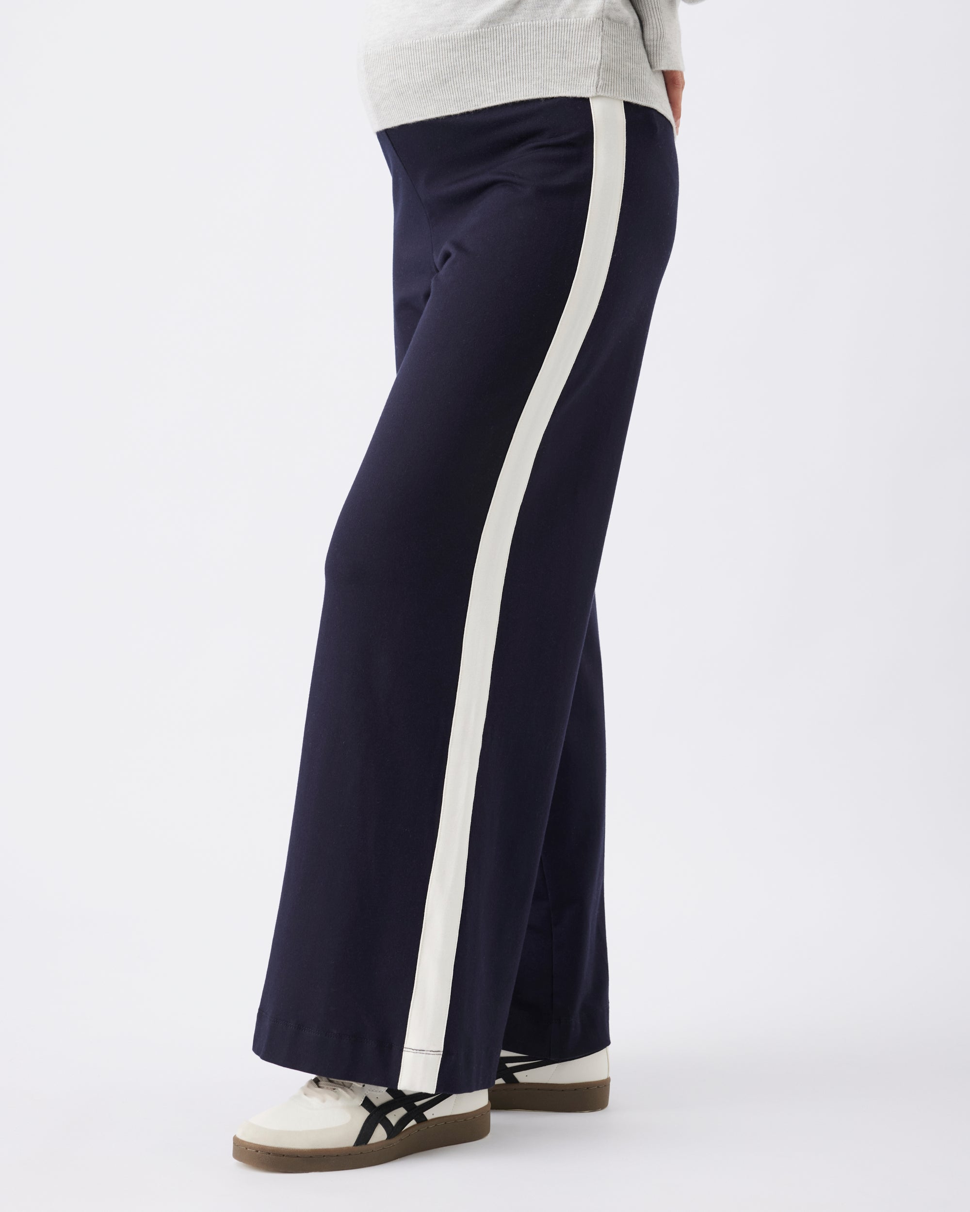 Maternity navy pants with a white stripe on a white background 